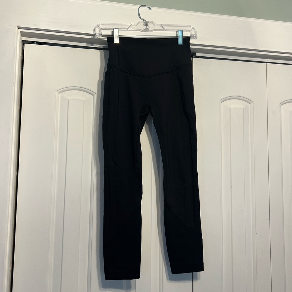 Lululemon Black Leggings with Side pockets - size 4
